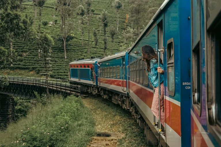 woman enjoying kandy to ella train ride14-Day Sri Lanka Tour Itinerary