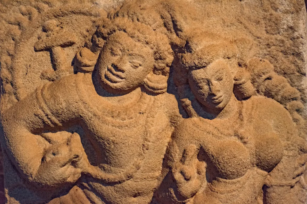 The famous Isurumuni Lovers carving, a highlight of the ancient city of Anuradhapura and a must-see for visitors.